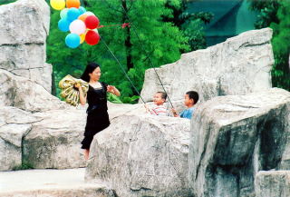 Z balonami na patyku